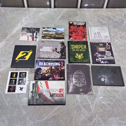 صورة مجموعه كتيبات وبوسترات لألعاب 