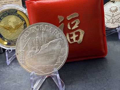 صورة عمله فضه تذكارية من سنغافورة فئة 10 دولارات